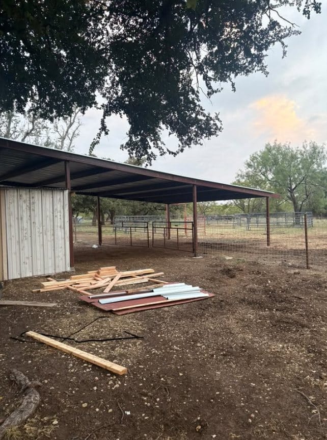 Metal building frame going up on a cleared pad