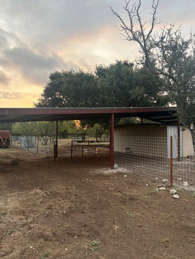 Finished open metal shelter